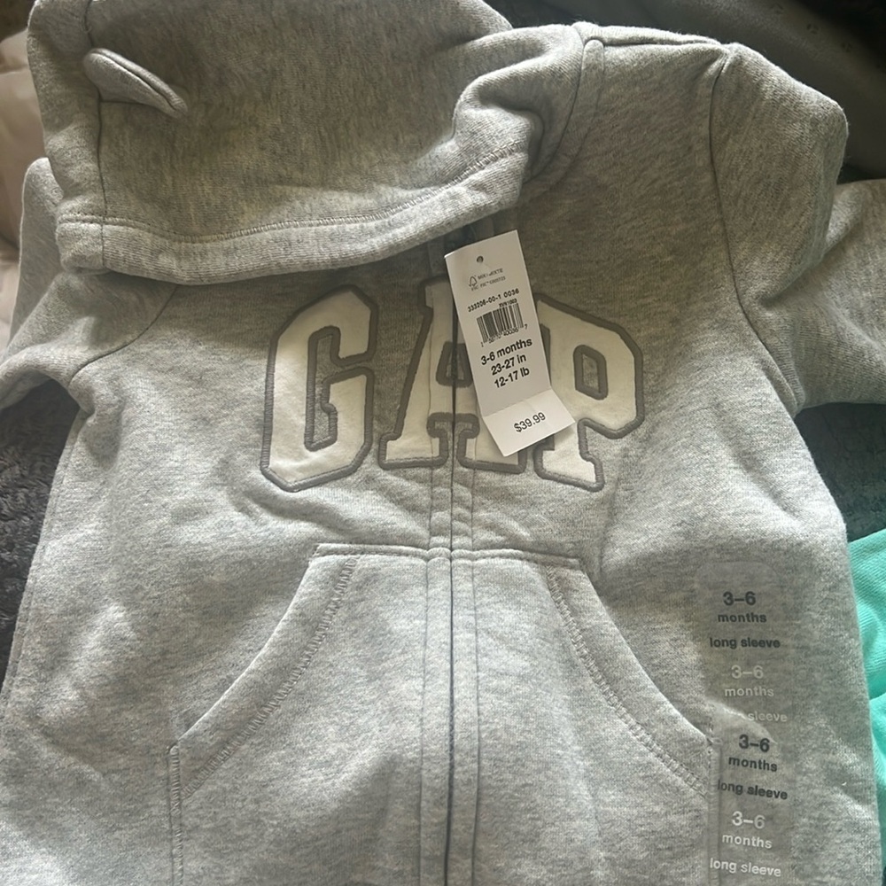 Brand new long sleeve onesie